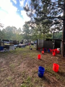 Bucket showers and laundry station